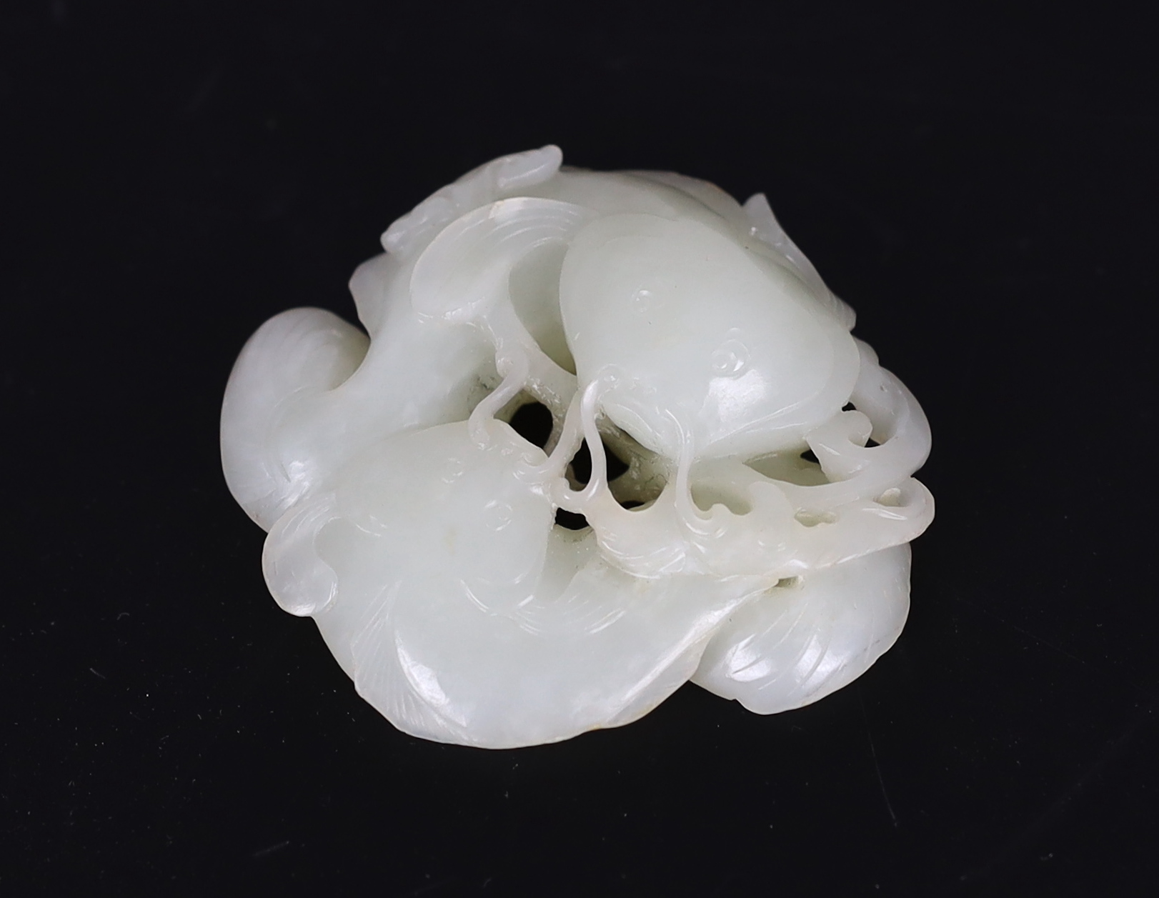 A Chinese white jade group of two catfish, 18th century